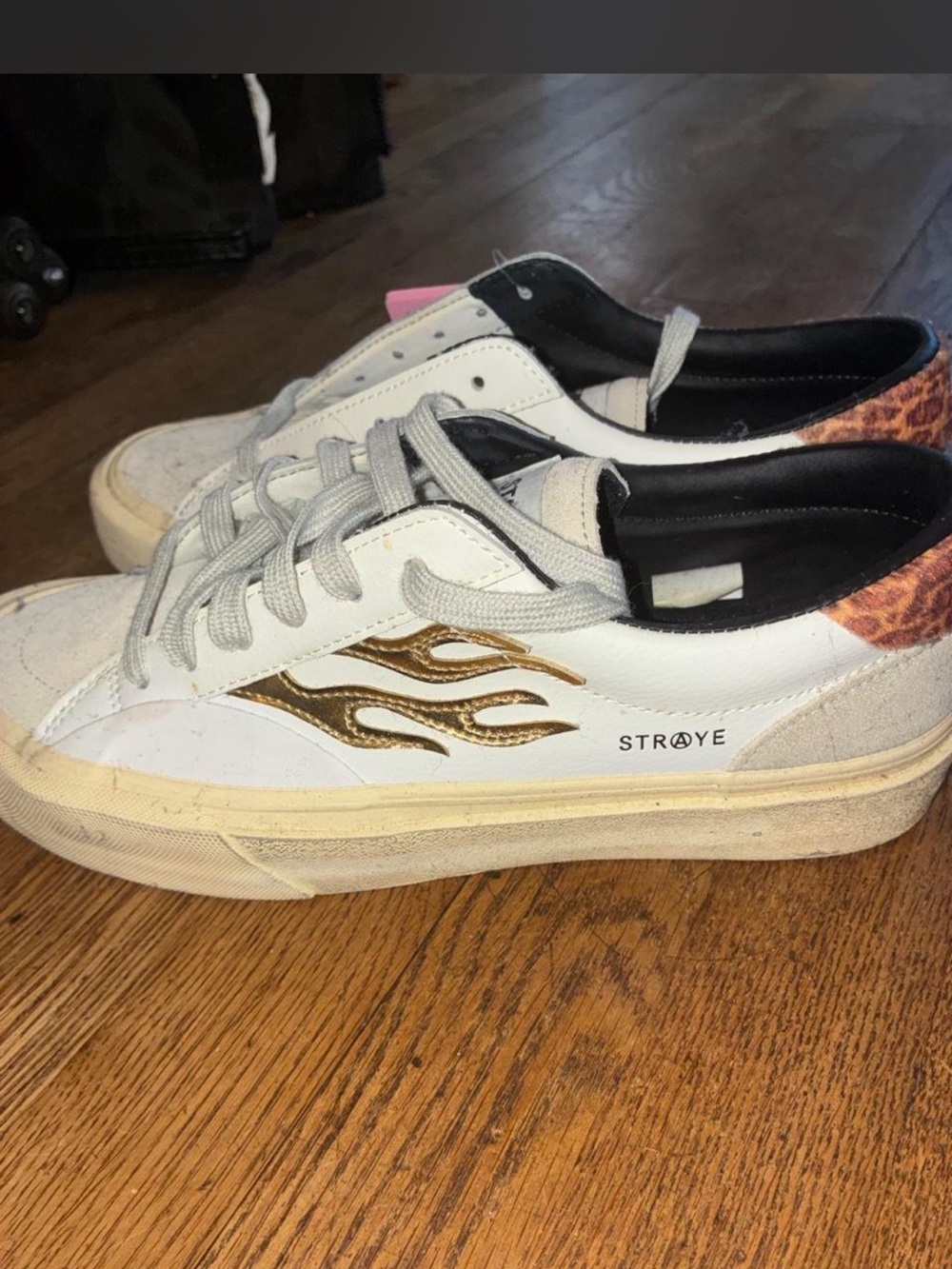 STÅYE Men’s White Sneakers with Gold Flame Accent
